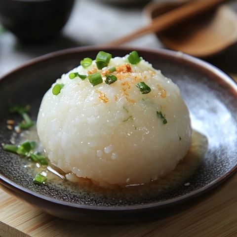 中國(guó)朝鮮族傳統(tǒng)美食:錘煉出味的糯米打糕