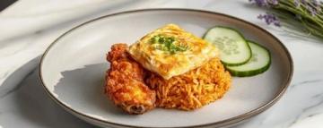 臨滄之味：佤族雞肉爛飯的獨(dú)特魅力