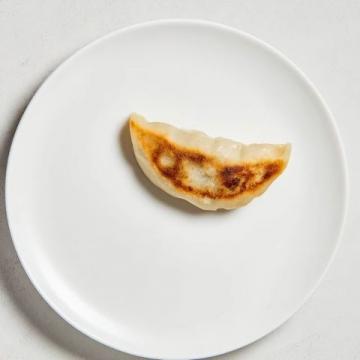 這里是超快手蔥油餅，口感十足